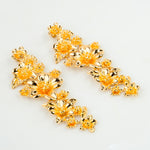 Load image into Gallery viewer, Ornate Golden Floral Dangler
